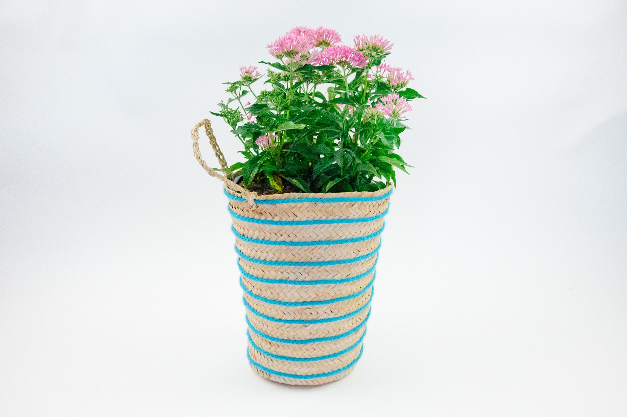 OTHELLO pompom basket STRIPED TURQUOISE